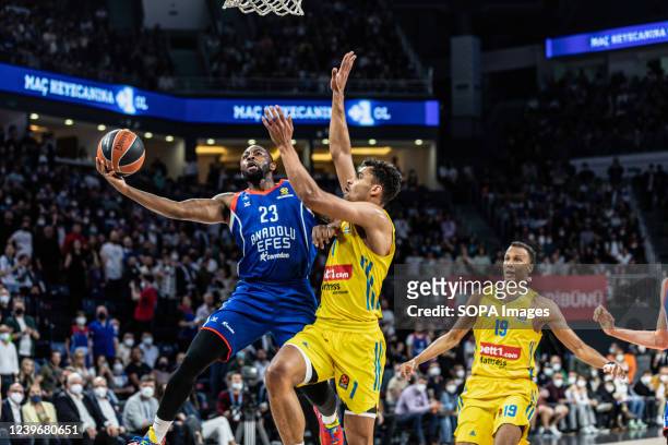 Oscar Da Silva of Alba Berlin and James Anderson of Anadolu Efes Istanbul seen in action during the Round 33 of the 2021/2022 Turkish Airlines...