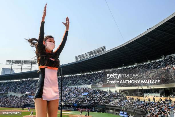 Cheerleader of the Hanwha Eagles dances during a match between Hanwha Eagles and Doosan Bears on the first day of the 2022 Korea Baseball...