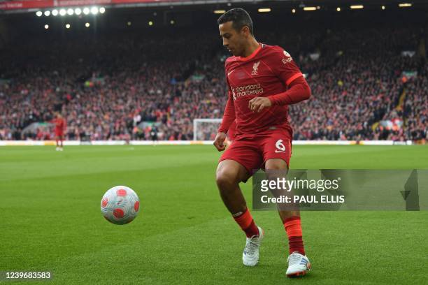 Liverpool's Spanish midfielder Thiago Alcantara controls the ball during the English Premier League football match between Liverpool and Watford at...