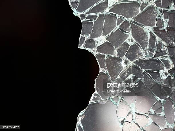 shattered glass on a black background - broken glass car stock pictures, royalty-free photos & images