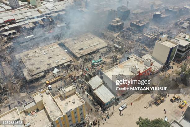 This earial view shows the aftermath of the fire that broke out at at Waaheen market in Hargeisa, Somaliland, on April 2, 2022. - A massive fire tore...