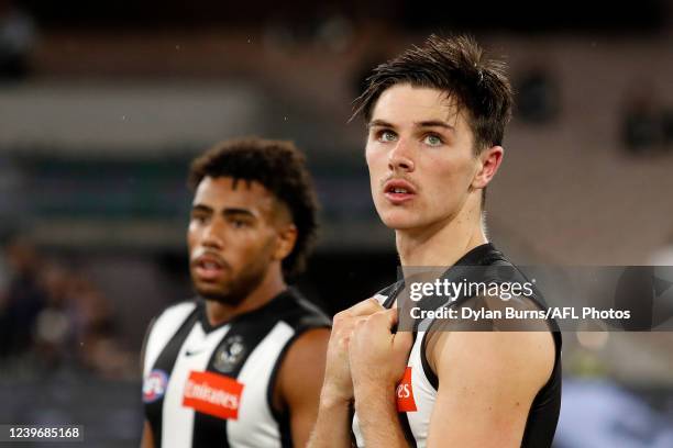 Oliver Henry of the Magpies looks dejected after a loss during the 2022 AFL Round 03 match between the Collingwood Magpies and the Geelong Cats at...