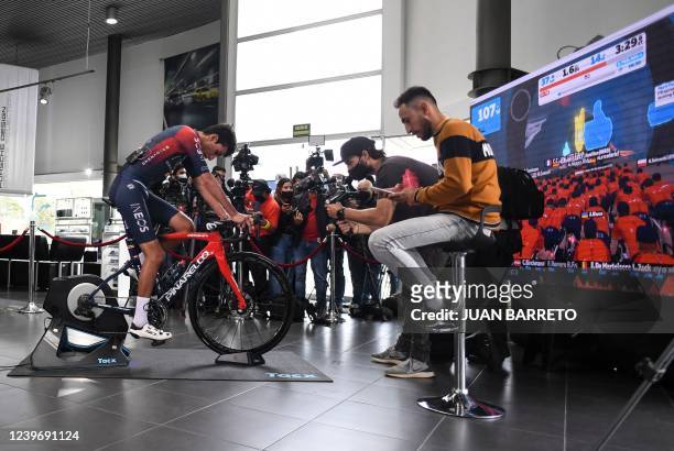 Team Ineos' Colombian rider Egan Bernal holds a virtual test during a press conference in Bogota on April 2 just ten weeks after hitting a bus at...