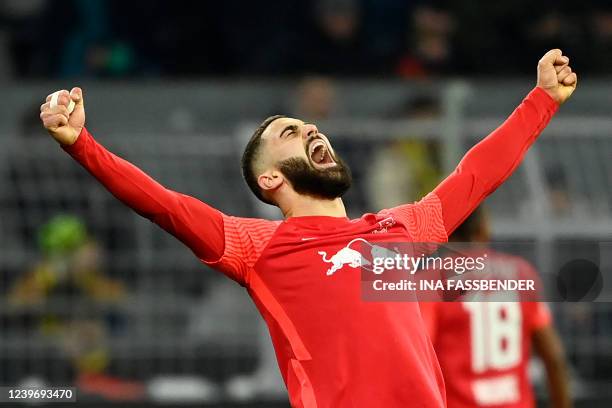 Leipzig's Croatian defender Josko Gvardiol celebrates at the end of the German first division Bundesliga football match Borussia Dortmund v RB...