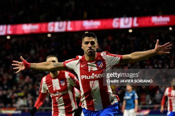 Atletico Madrid's Uruguayan forward Luis Suarez celebrates after scoring a goal during the Spanish League football match between Club Atletico de...