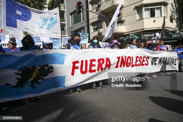 Citizens carrying anti-British banners gather during a demonstration marking the 40th anniversary of the Malvinas War between Argentina and England...