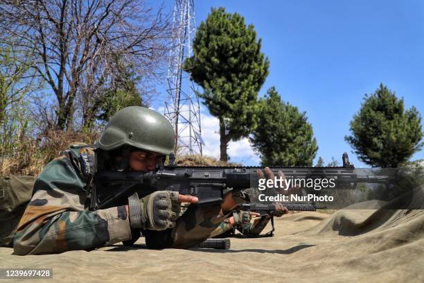 Indian army soldiers shoots a target during a practice session at a Forward Post at LoC Line Of Control in Uri, Baramulla, Jammu and Kashmir, India...