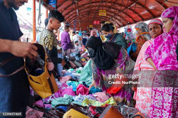 People gather at Dhaka New market for shopping ahead ramadan in Dhaka, Bangladesh on April 02, 2022.