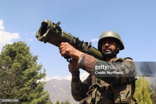 An Indian Army Soldier looks through a 84 MM RL Gun at a Forward Post at LoC Line Of Control in Uri, Baramulla, Jammu and Kashmir, India on 02 April...