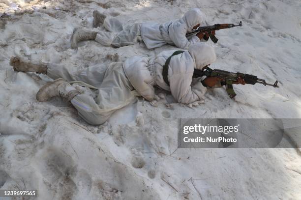 Indian army soldiers patrol on snow at a Forward Post at LoC Line Of Control in Uri, Baramulla, Jammu and Kashmir, India on 02 April 2022. The Line...