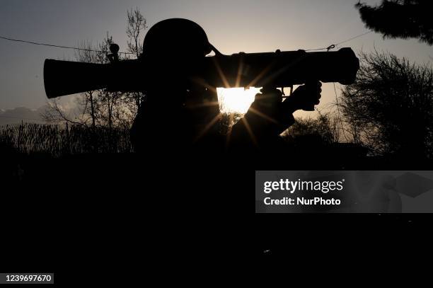 An Indian Army Soldier holds a 84 MM RL Gun at a Forward Post at LoC Line Of Control in Uri, Baramulla, Jammu and Kashmir, India on 02 April 2022....