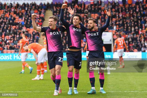 Ryan Yates and Brennan Johnson celebrate with Philip Zinkernagel of Nottingham Forest after scoring a to make it 0-1 during the Sky Bet Championship...