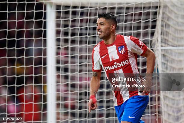 Luis Suarez of Atletico Madrid celebrates after scoring his sides second goal during the La Liga Santander match between Club Atletico de Madrid and...