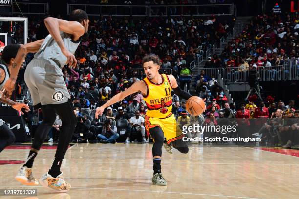 Trae Young of the Atlanta Hawks drives to the basket during the game against the Brooklyn Nets on April 2, 2022 at State Farm Arena in Atlanta,...