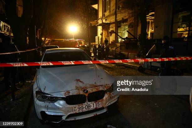 Firefighters and security forces conduct investigations at the scene after an explosion at an entertainment venue in Azerbaijani capital of Baku on...