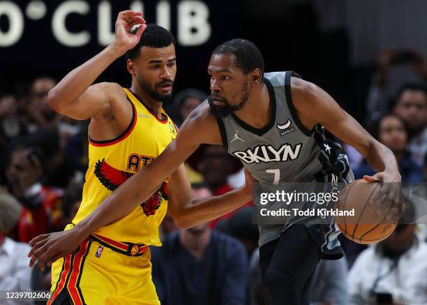 Kevin Durant of the Brooklyn Nets controls the ball against Timothe Luwawu-Cabarrot of the Atlanta Hawks during the second half at State Farm Arena...