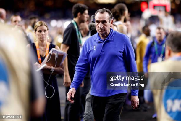 Head coach Mike Krzyzewski of the Duke Blue Devils walks toward the locker room following their loss to the North Carolina Tar Heels during the 2022...