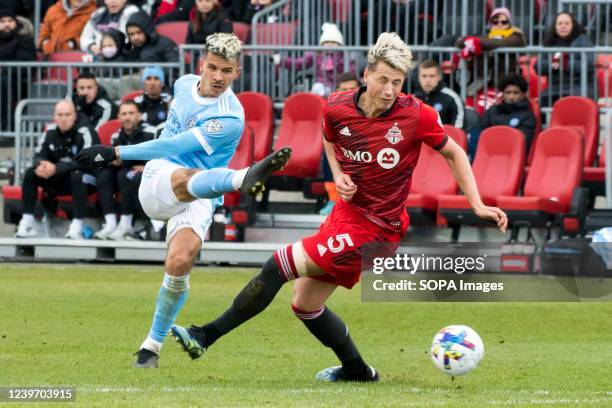 Alfredo Morales and Lukas MacNaughton in action during the MLS game between Toronto FC and New York City FC at BMO Field. The game ended 2-1 for...