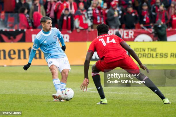 Santiago RodrÃ­guez and Noble Okello in action during the MLS game between Toronto FC and New York City FC at BMO Field. The game ended 2-1 for...