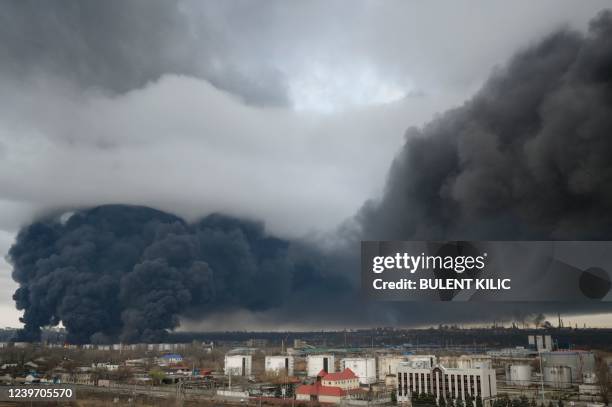 Smoke rises after an attack by Russian army in Odessa, on April 3, 2022. - Air strikes rocked Ukraine's strategic Black Sea port Odessa early Sunday...