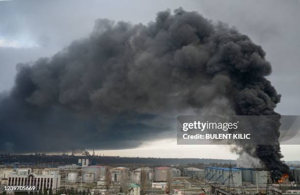 Smoke rises after an attack by Russian army in Odessa, on April 3, 2022. - Air strikes rocked Ukraine's strategic Black Sea port Odessa early Sunday...