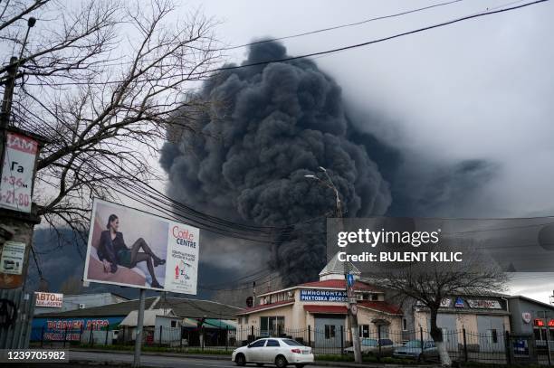 Smoke rises after an attack by Russian army in Odessa, on April 3, 2022. - Air strikes rocked Ukraine's strategic Black Sea port Odessa early Sunday...