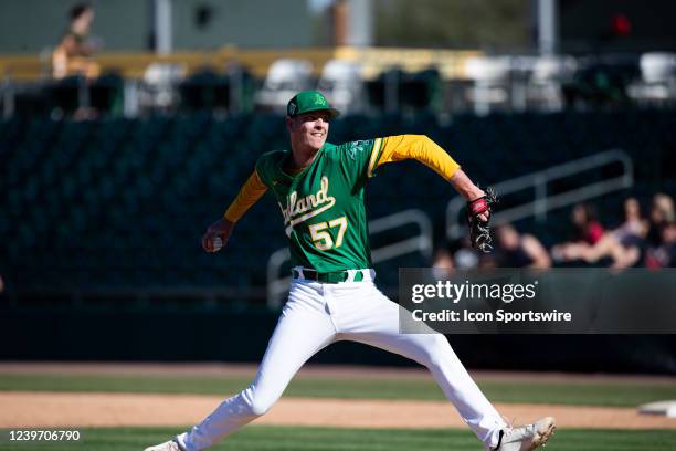 Brian Howard of the Oakland Athletics come in to relief pitch during a Spring Training Baseball game between the Colorado Rockies and Oakland...