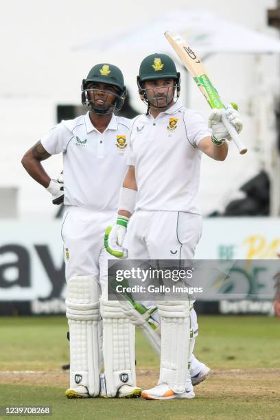 Dean Elgar of South Africa celebrates fifty runs with Keegan Petersen during day 4 of the 1st ICC WTC2 Betway Test match between South Africa and...