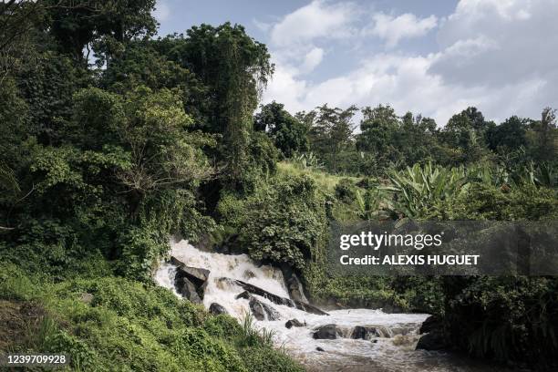 This photograph taken on April 1, 2022 shows the Rutshuru River in eastern Democratic Republic of the Congo, which feeds the hydroelectric power...