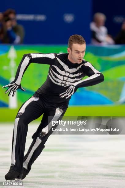 Kevin van der Perren of Belgium competing in the short program element of the men's single skating competition during the 2010 Winter Olympics at the...