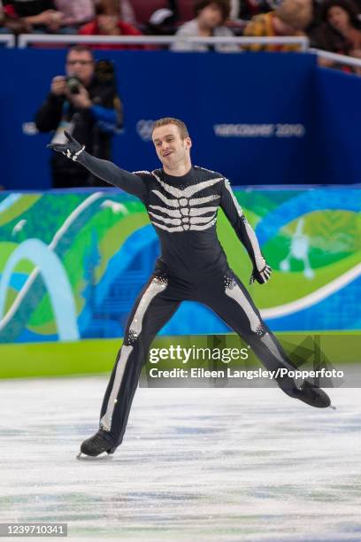 Kevin van der Perren of Belgium competing in the short program element of the men's single skating competition during the 2010 Winter Olympics at the...