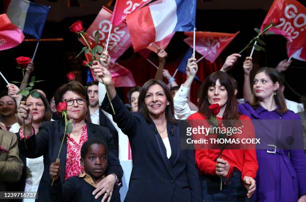 French Socialist Party presidential candidate Anne Hidalgo waves next to Lille mayor Martine Aubry , French actress and film director Valerie...