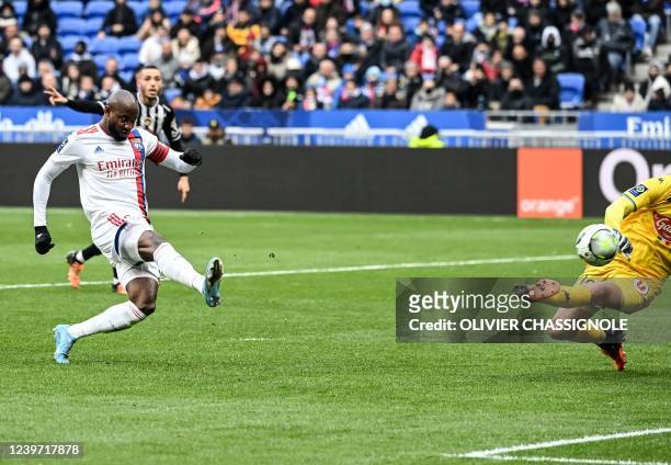 Lyons French forward Moussa Dembele scores a goal during the French L1 football match between Olympique Lyonnais and Angers at the Groupama Stadium...