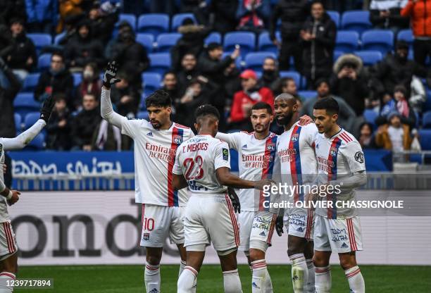 Olympique Lyonnais' Brazilian Lucas Paqueta celebrates with Olympique Lyonnais's players after a goal during the French L1 football match between...