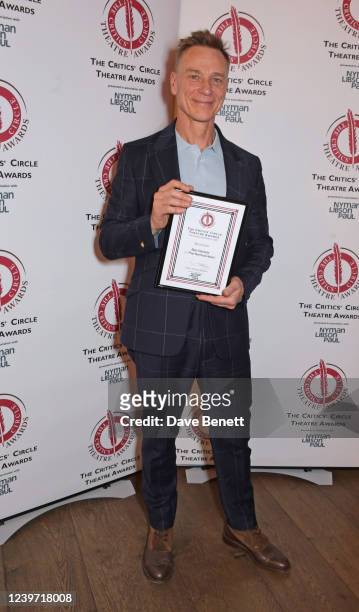 Ben Daniels, winner of the Best Actor award for "The Normal Heart", poses in the Winners room at the 31st Annual Critics' Circle Theatre Awards at...