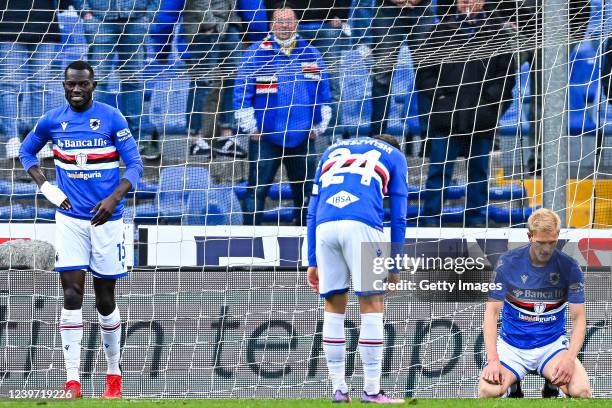 Omar Colley , Bartosz Bereszynski and Morten Thorsby of Sampdoria react with disappointment after Henrikh Mkhitarian of Roma has scored a goal during...