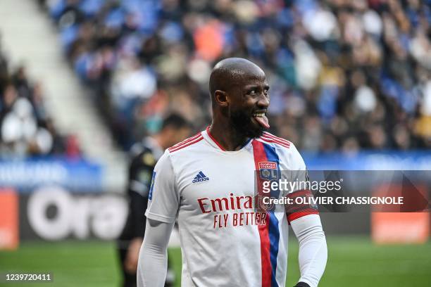 Lyons French forward Moussa Dembele reacts during the French L1 football match between Olympique Lyonnais and Angers at the Groupama Stadium in...