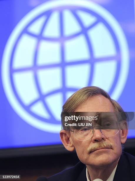 World Bank president Robert Zoellick listens to a question from the media at a press conference in Beijing on September 5, 2011. Zoellick said that...