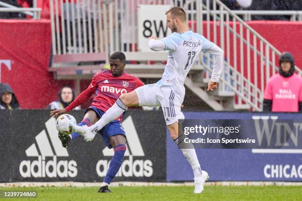 Dallas defender Nanú battles with Chicago Fire forward Kacper Przybyko in action during a game between the Chicago Fire and the FC Dallas on April 2,...
