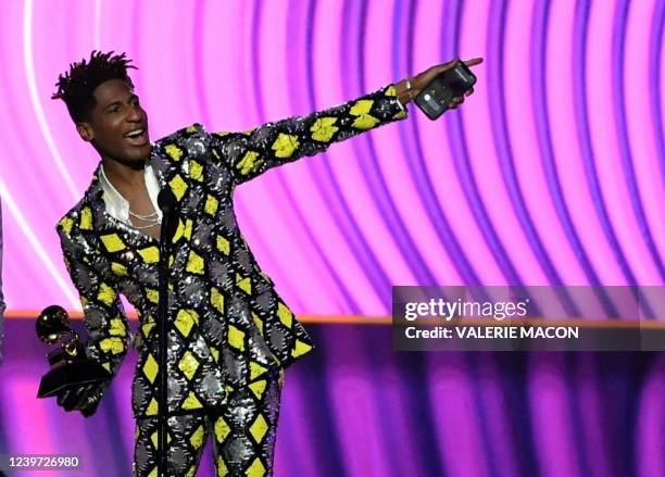 Musician Jon Batiste with Alan Ferguson and Alex P. Willson accepts the trophy for Best Music Video during the 64th Annual Grammy Awards pre-telecast...