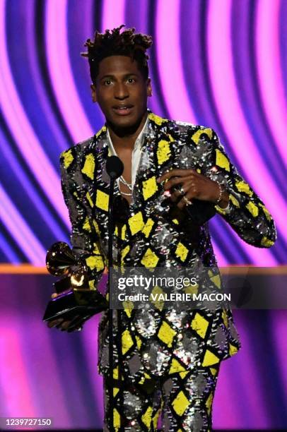 Musician Jon Batiste with Alan Ferguson and Alex P. Willson accepts the trophy for Best Music Video during the 64th Annual Grammy Awards pre-telecast...