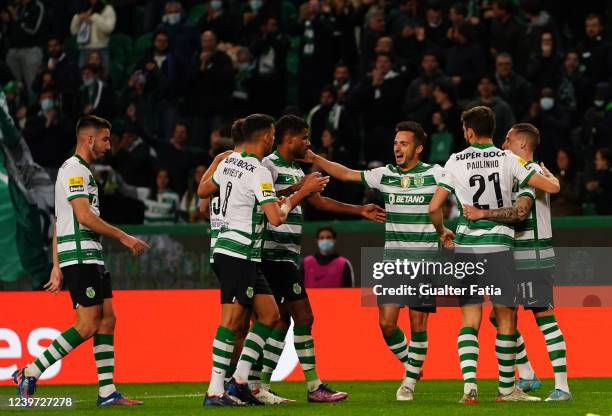 Nuno Santos of Sporting CP celebrates with teammates after scoring a goal during the Liga Bwin match between Sporting CP and FC Pacos de Ferreira at...