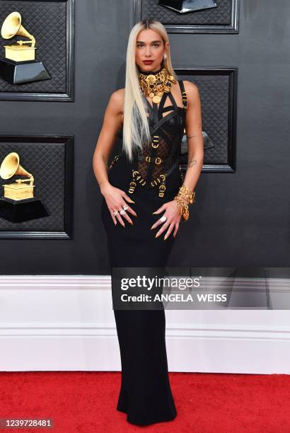 English singer-songwriter Dua Lipa arrives for the 64th Annual Grammy Awards at the MGM Grand Garden Arena in Las Vegas on April 3, 2022.