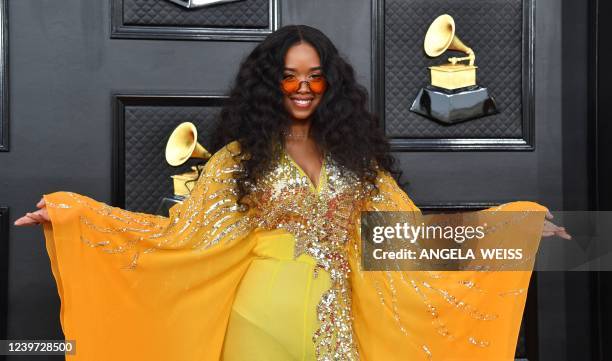 Singer H.E.R. Arrives for the 64th Annual Grammy Awards at the MGM Grand Garden Arena in Las Vegas on April 3, 2022.