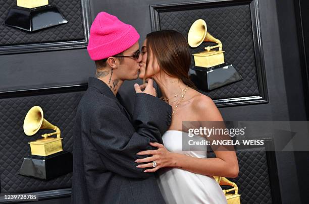 Canadian singer-songwriter Justin Bieber and US model Hailey Bieber arrive for the 64th Annual Grammy Awards at the MGM Grand Garden Arena in Las...