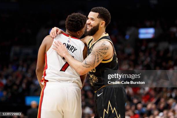 Kyle Lowry of the Miami Heat and Fred VanVleet of the Toronto Raptors joke around during the first half at Scotiabank Arena on April 3, 2022 in...