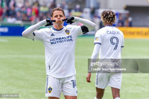 LAGlaxy forward Javier Hernández "Chicharrito" taunts the Portland Timbers Army supporters group after his first goal iduring the MLS match between...