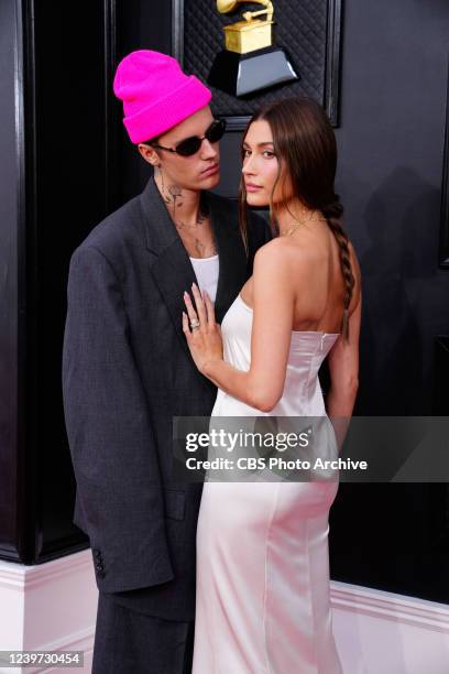 Justin Bieber and Hailey Bieber arrive at THE 64TH ANNUAL GRAMMY AWARDS, broadcasting live Sunday, April 3 on the CBS Television Network, and...