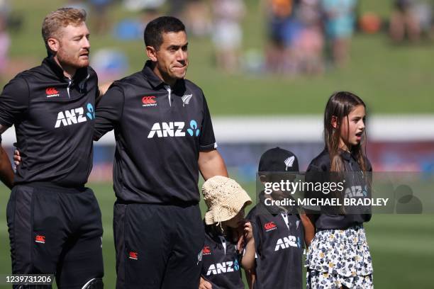 New Zealands Ross Taylor lines up for the national anthems with his children Adelaide, Jonty and Mackenzie and teammate Martin Guptill before the...