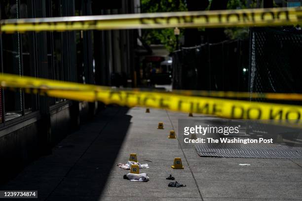 The crime scene at 10th Street and J Street in downtown Sacramento where 6 people were shot and killed, and 10 injured, at 2 am Saturday night in...